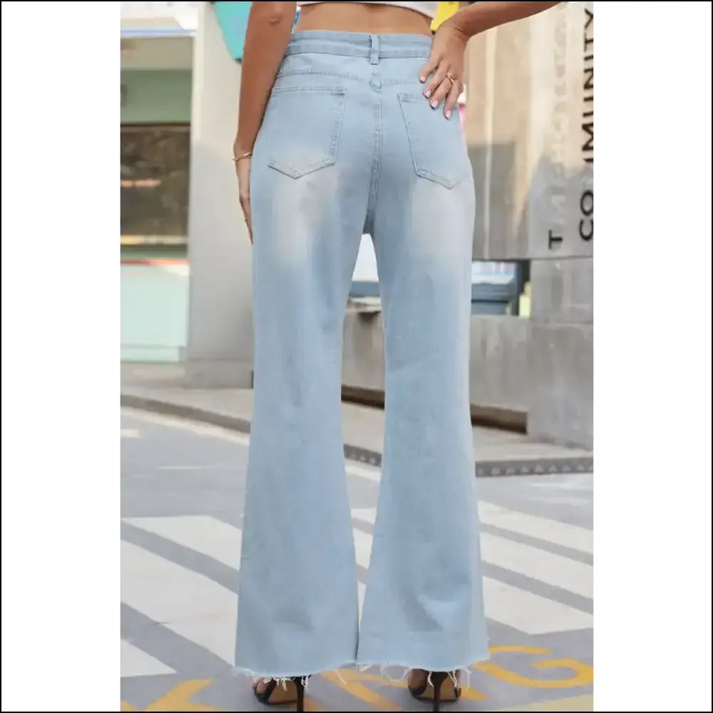 Finally, Jeans that Don’t Judge your Pizza Habit - Chic Distressed Buttoned Magic! 🍕✨